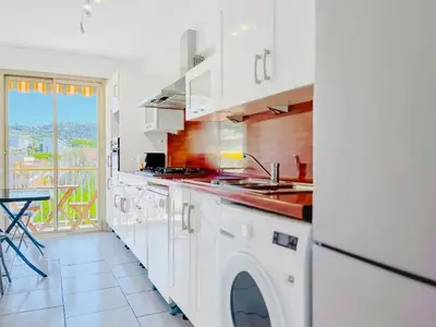 Cuisine ou kitchenette dans l'établissement L'Oasis - 3 Pièces centre Cannes