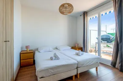 Un ou plusieurs lits dans un hébergement de l'établissement La Terrasse Zéphyr - Welkeys