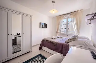 Un ou plusieurs lits dans un hébergement de l'établissement L'EDEN SQUARE Apartment for 4 By Sunset