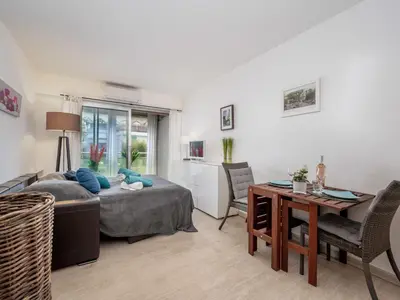 Coin salon dans l'établissement Apartment Les Sablons-2 by Interhome