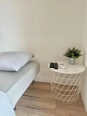 Un ou plusieurs lits dans un hébergement de l'établissement Le bijou plage