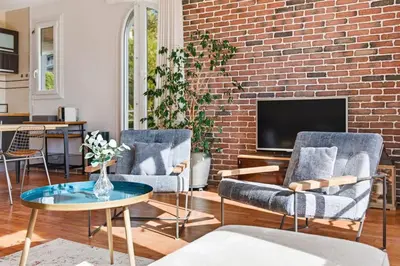 Coin salon dans l'établissement Cozy 1 bedroom flat,free parking, close to center