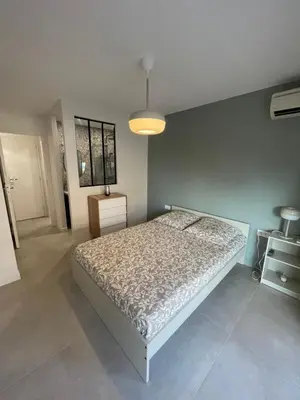 Un ou plusieurs lits dans un hébergement de l'établissement Appartement Juan les pins