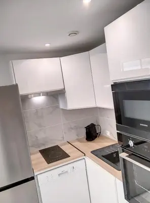 Cuisine ou kitchenette dans l'établissement Résidence Graziella Appartement 99