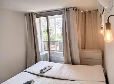 Un ou plusieurs lits dans un hébergement de l'établissement Résidence Graziella Appartement 99