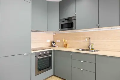 Cuisine ou kitchenette dans l'établissement Cozy renovated apartment - close to Martinez Hotel