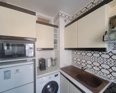 Cuisine ou kitchenette dans l'établissement LE LINDOS T2 PROCHE PLAGES