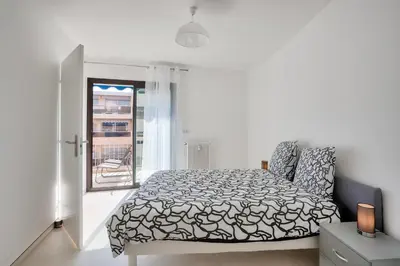 Un ou plusieurs lits dans un hébergement de l'établissement LE BALZAC T3 centre ville proche toutes commodités