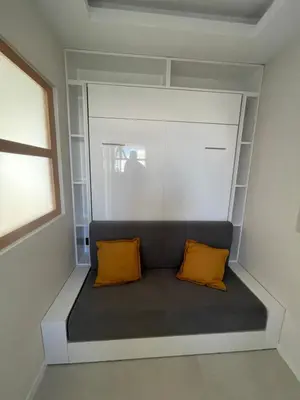 Coin salon dans l'établissement 06AO - Superbe appartement avec vue mer exceptionnelle