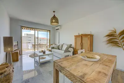 Coin salon dans l'établissement Cannes Californie Beautiful Apt with Sea View