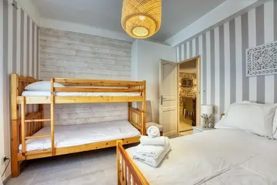 Un ou plusieurs lits dans un hébergement de l'établissement NEW 2-bed Central Cannes Apt