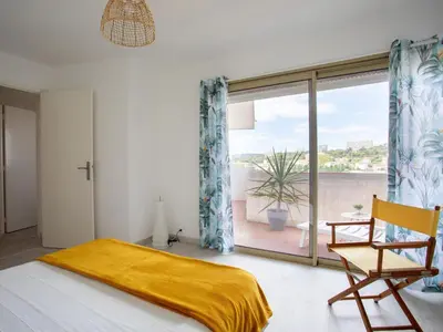 Un ou plusieurs lits dans un hébergement de l'établissement Apartment Le Montcey by Interhome