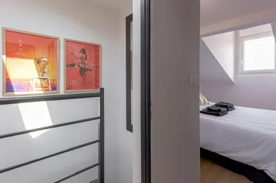 Un ou plusieurs lits dans un hébergement de l'établissement Duplex Pradignac by Halldis