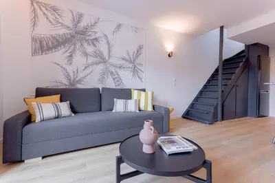 Coin salon dans l'établissement Duplex Pradignac by Halldis