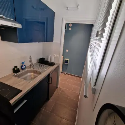 Cuisine ou kitchenette dans l'établissement magnifique studio 2 pers, plage à 120 mètres