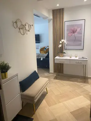 Un ou plusieurs lits dans un hébergement de l'établissement Elegant apartment close to Croisette and Palais de Festival with garage