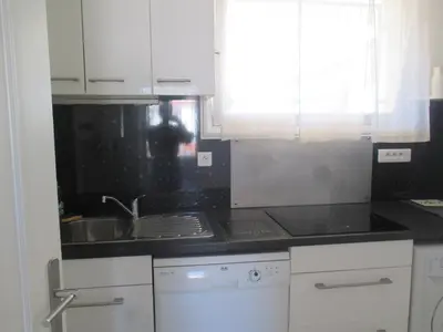 Cuisine ou kitchenette dans l'établissement Studio à 10 min de la croisette et de la mer et 5 min de la gare