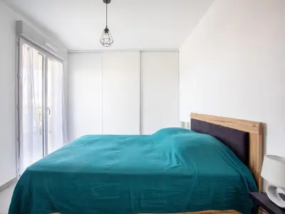 Un ou plusieurs lits dans un hébergement de l'établissement Apartment Rive de Cagnes by Interhome