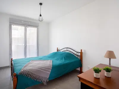 Un ou plusieurs lits dans un hébergement de l'établissement Apartment Rive de Cagnes by Interhome
