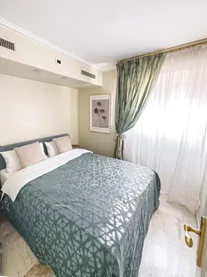 Un ou plusieurs lits dans un hébergement de l'établissement Cosy stay - LA CROISETTE