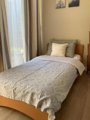 Un ou plusieurs lits dans un hébergement de l'établissement Luxury One bedroom with garden