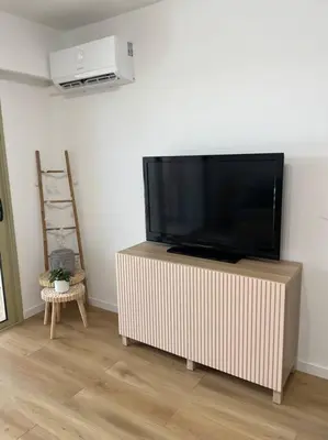 Télévision ou salle de divertissement dans l'établissement Studio La Douce