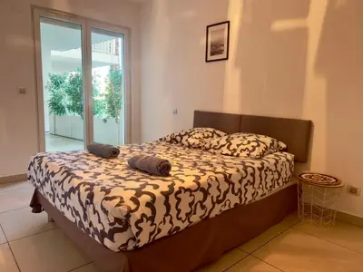 Un ou plusieurs lits dans un hébergement de l'établissement Cannes Maria SCLS - Wifi, Parking, Spacieux