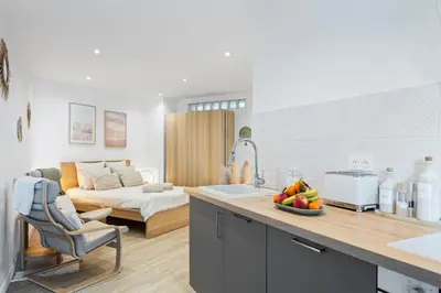 Coin salon dans l'établissement Appartement bord de mer « La Petite Ma-Line »