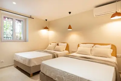 Un ou plusieurs lits dans un hébergement de l'établissement Modern Luxury Apartment 6 pax