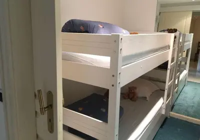 Un ou plusieurs lits dans un hébergement de l'établissement Appartement Miramar Cannes Croisette