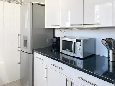 Cuisine ou kitchenette dans l'établissement La pinede Apartement equiped with air conditioning and a pool!