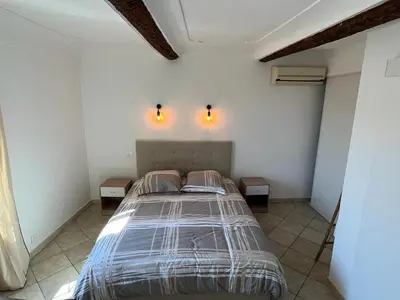 Un ou plusieurs lits dans un hébergement de l'établissement Duplex vieille ville