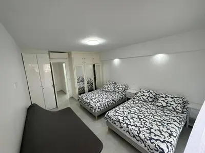 Un ou plusieurs lits dans un hébergement de l'établissement Impeccable 3 pièces 80m2 double balcons,proche mer Juan les pins proche Cannes