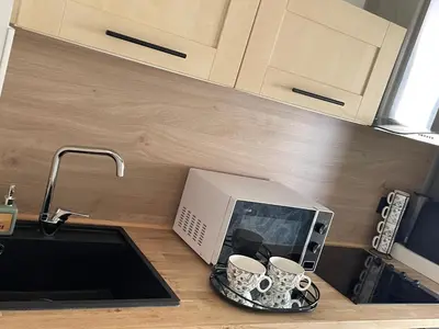 Cuisine ou kitchenette dans l'établissement New apartment at 150m from the beaches Easy check in