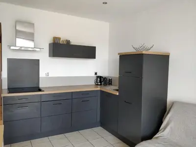 Cuisine ou kitchenette dans l'établissement Le Palais du Tropique