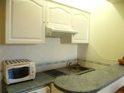 Cuisine ou kitchenette dans l'établissement Studio Croisette