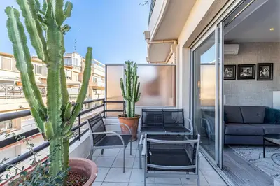 Coin salon dans l'établissement Magnificent studio with terrace - center of Cannes