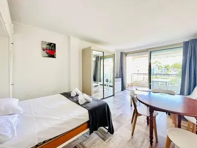 Un ou plusieurs lits dans un hébergement de l'établissement Grand Hotel - Studio Croisette