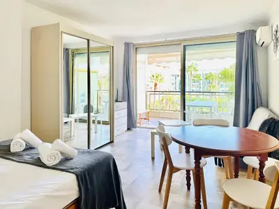 Un ou plusieurs lits dans un hébergement de l'établissement Grand Hotel - Studio Croisette