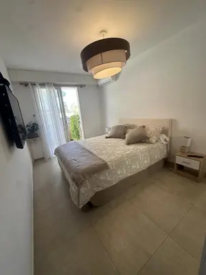 Un ou plusieurs lits dans un hébergement de l'établissement Bel appartement, sans mauvaises surprises