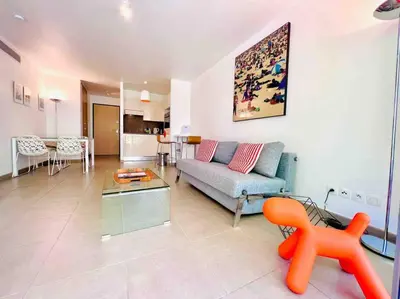 Coin salon dans l'établissement Le White Pearl : Apt 4 Prs, Parking, Clim