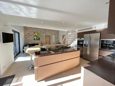Cuisine ou kitchenette dans l'établissement Capleouna-Villa la Cabane