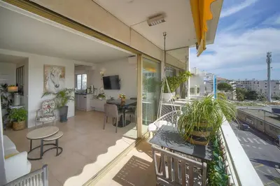 Balcon ou terrasse dans l'établissement FRGK 'Etoile du sud TERRASSE Vue Mer PALM BEACH WIFI FIBRE'