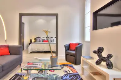 Coin salon dans l'établissement Appartement Cannes 4 chambres - 5G
