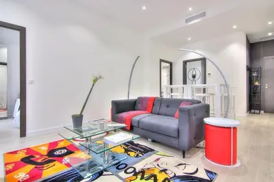Coin salon dans l'établissement Appartement Cannes 4 chambres - 5G