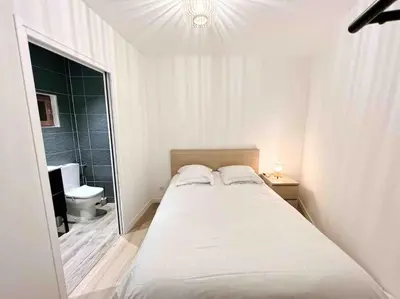 Un ou plusieurs lits dans un hébergement de l'établissement Le James Close: Apt 4 Prs standing - Vieille Ville