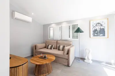 Coin salon dans l'établissement Maisonnette à 400m de la Plage