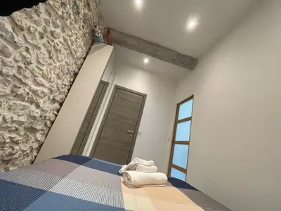 Un ou plusieurs lits dans un hébergement de l'établissement Charming Haven in Antibes