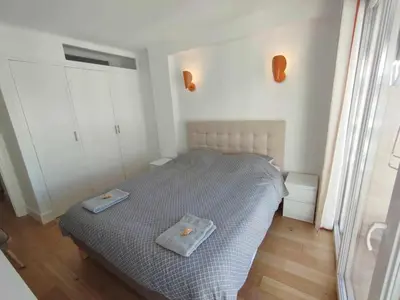 Un ou plusieurs lits dans un hébergement de l'établissement Cannes Pointe Croisette T2 plage 2min à pieds 46m2