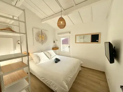 Un ou plusieurs lits dans un hébergement de l'établissement Cosy 3 pièces vieil Antibes proche port Vauban